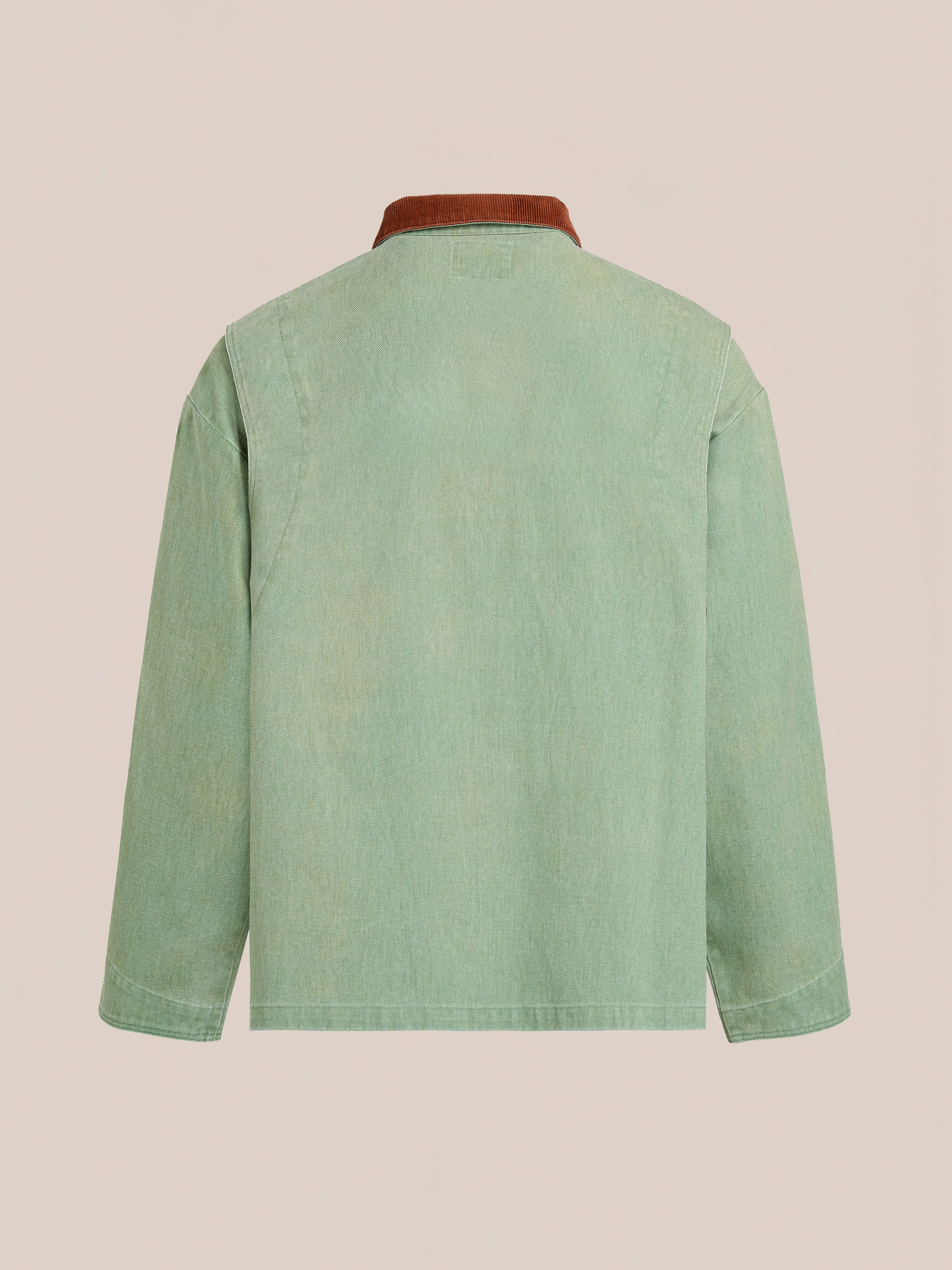 The Found Washed Fireman Clasp Workshop Jacket is a light green unisex jacket with long sleeves and a brown corduroy collar, displayed from the back against a plain background.