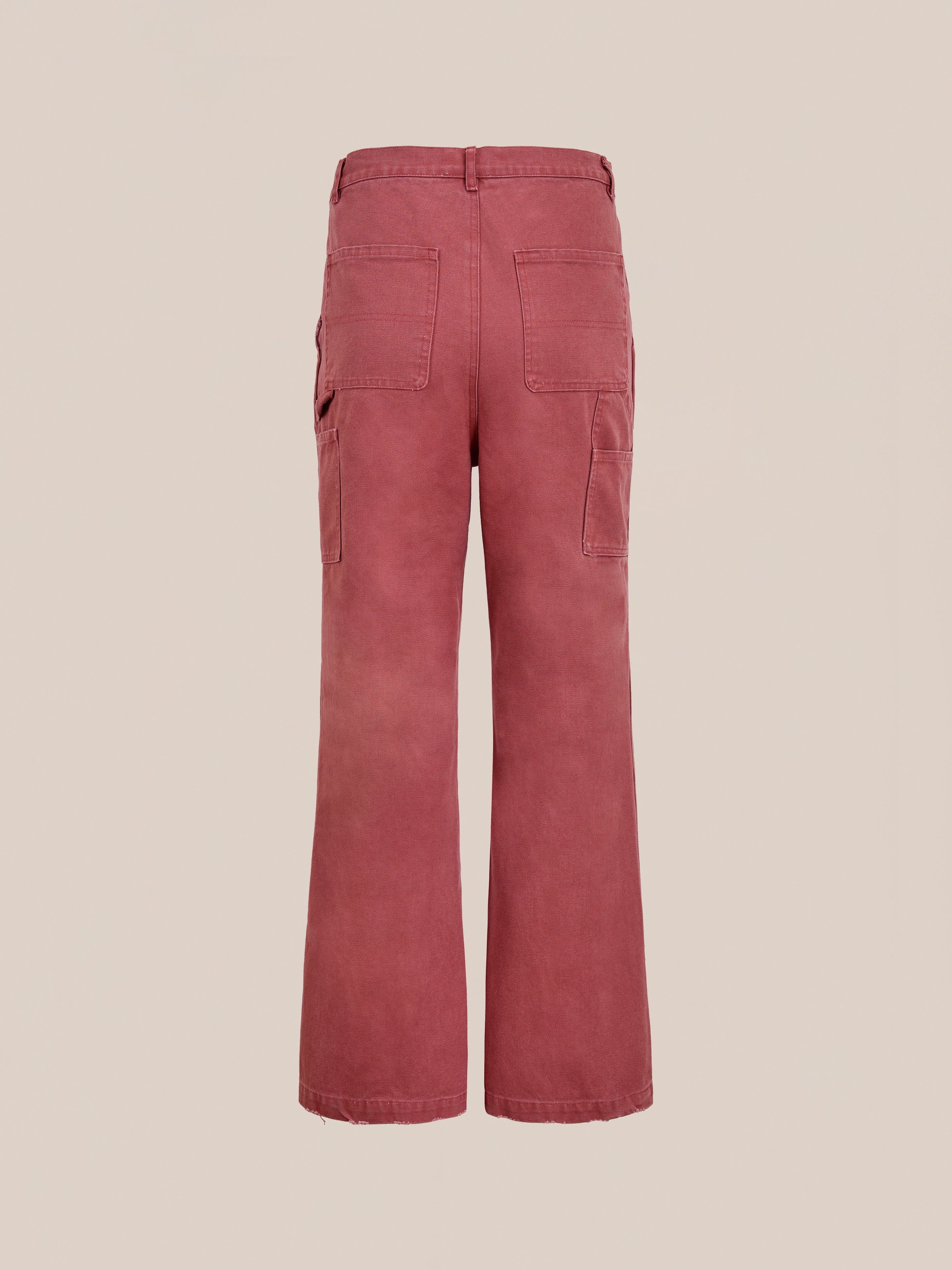 The FOUND Canvas Faded Pants feature a high-waisted, wide-leg vintage-inspired design with back patch pockets and visible stitching, shown against a plain beige background.