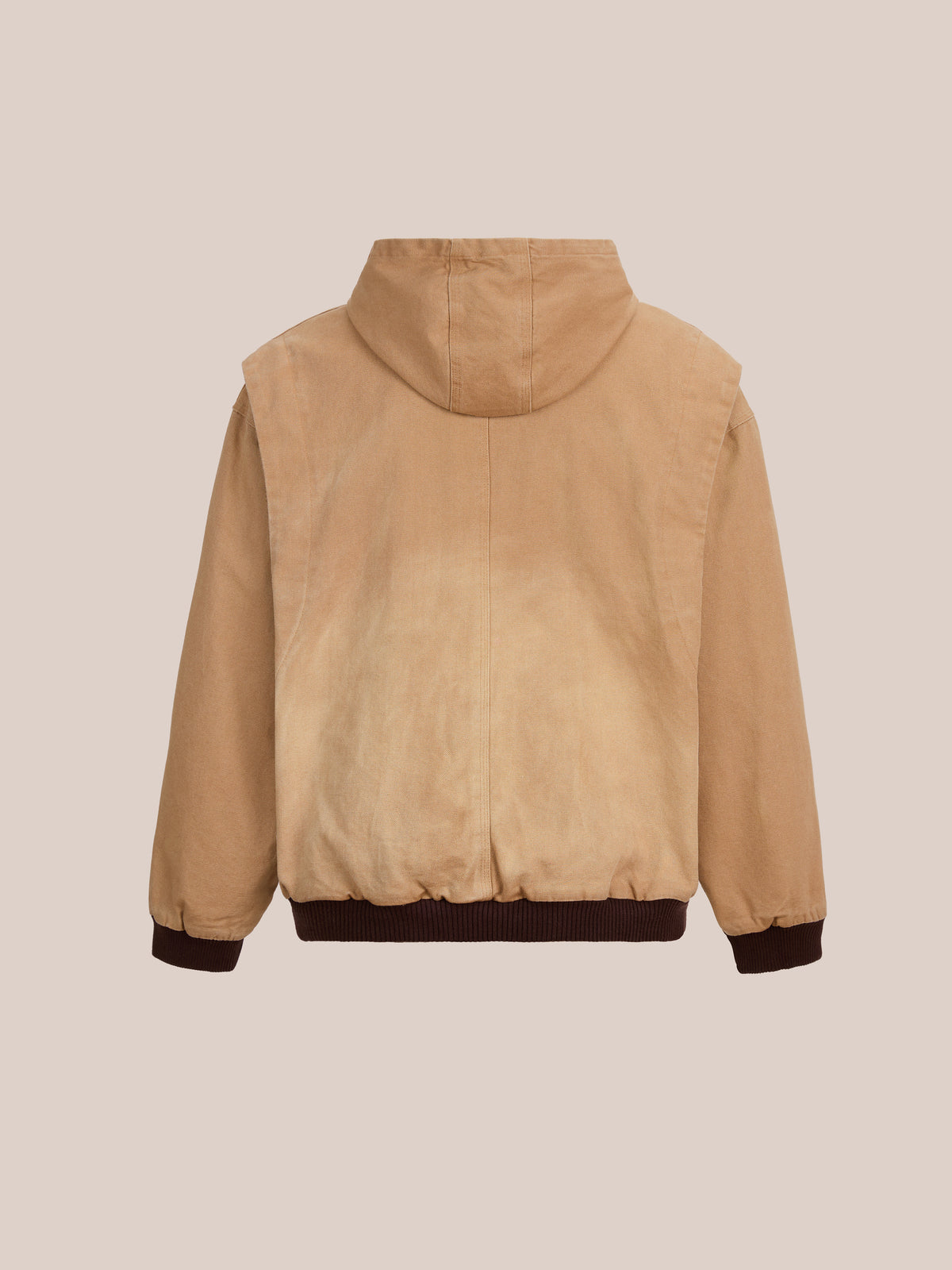 FOUND Faded Canvas Work Hoodie in tan, unisex relaxed fit, shown from the back with brown ribbed cuffs and waistband against a beige background.