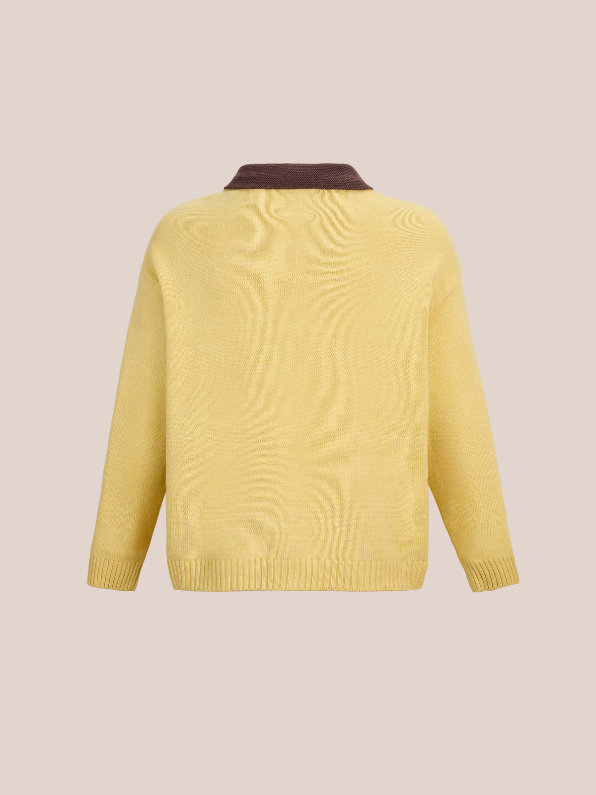 Floral Sun Knit Sweater by FOUND in yellow with a brown collar, displayed from the back on a beige background.