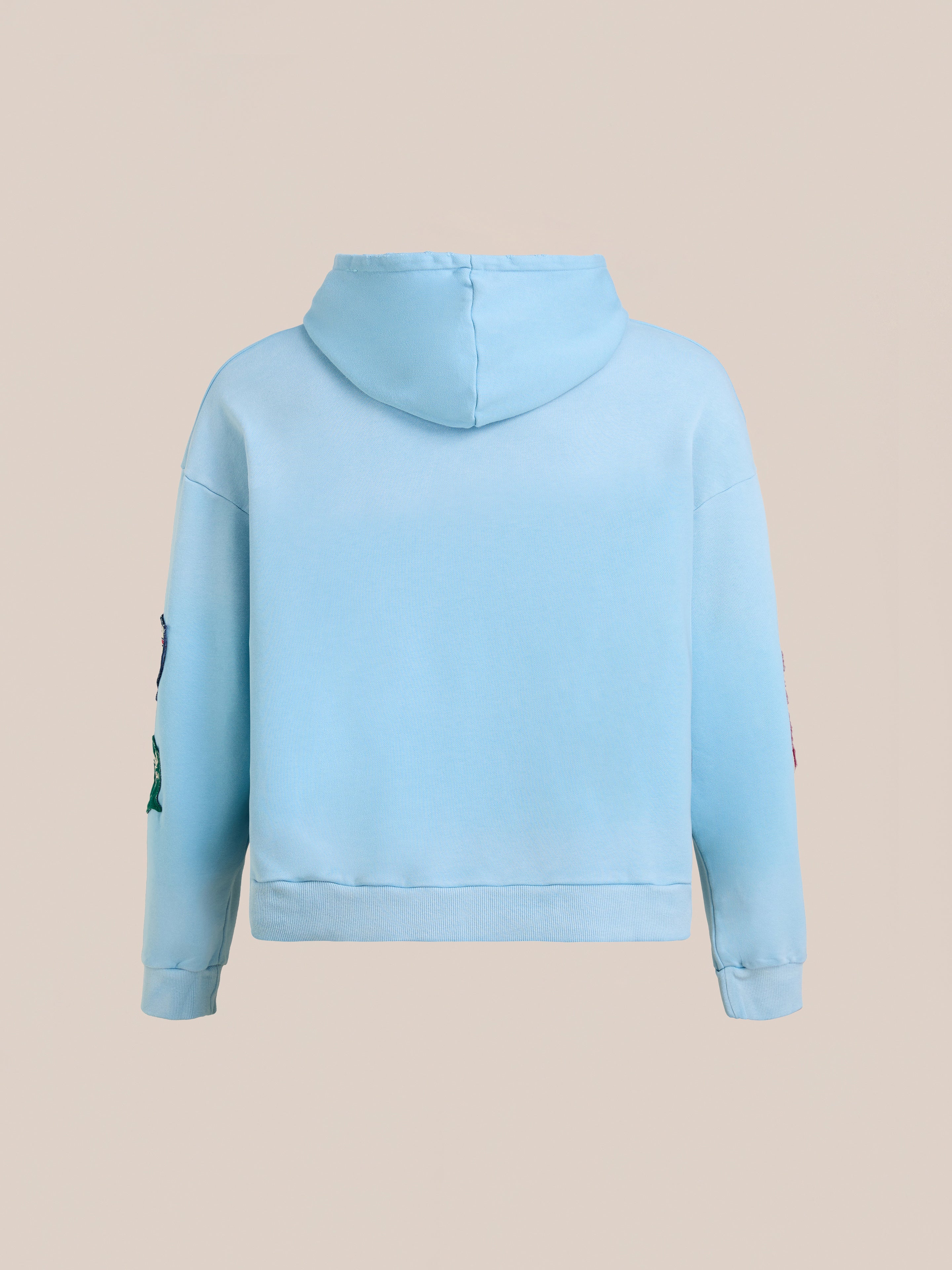 The FOUND Horse Line Hoodie, made from light blue French Terry cotton, is displayed from the back against a plain beige background.