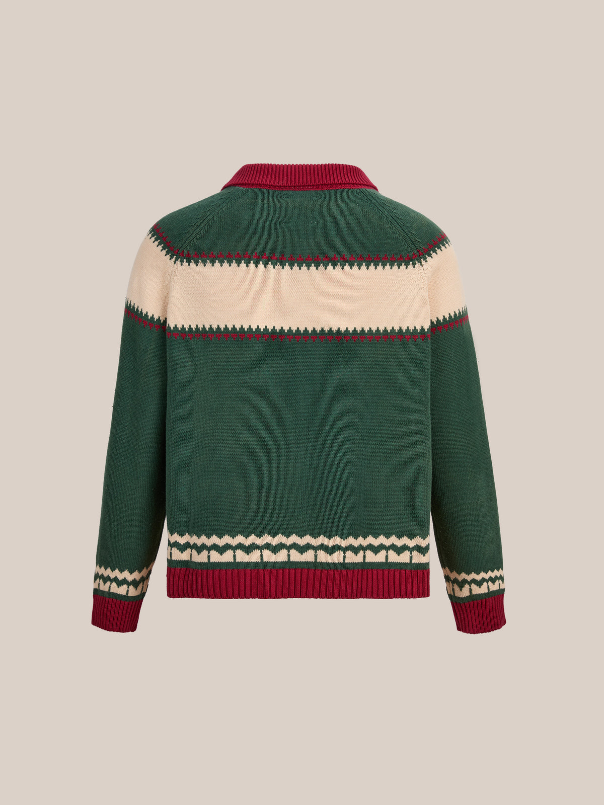 The FOUND Isles Sweater features green knit with cream and red geometric patterns, long sleeves, a red collar, and ribbed cuffs—shown on a beige background.