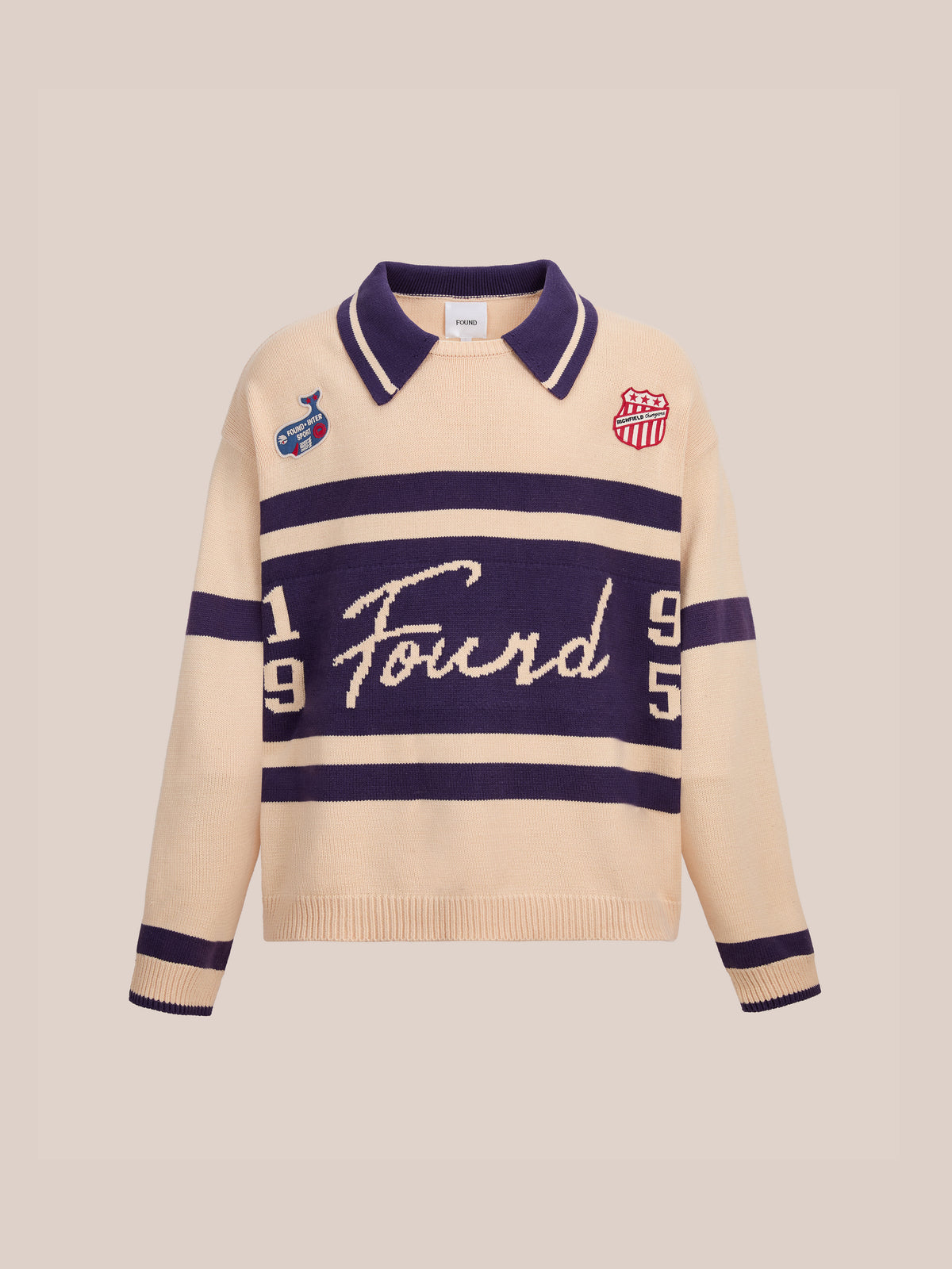 FOUND Knit Jersey in beige and navy with “Found” and “1995” text, collar, plus two embroidered front patches.