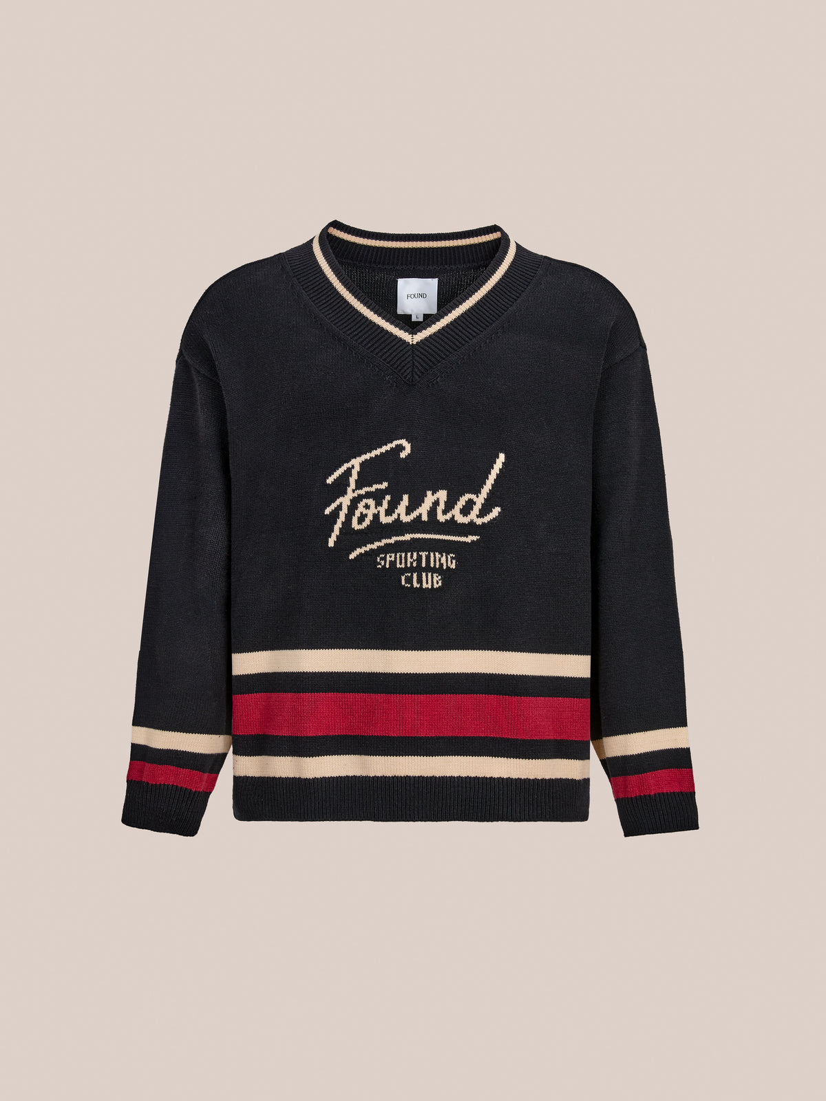 FOUND Sport Club Varsity Sweater: Black unisex V-neck with cream/red stripes and “Found Sporting Club” text—a modern twist on classic athletic knitwear.
