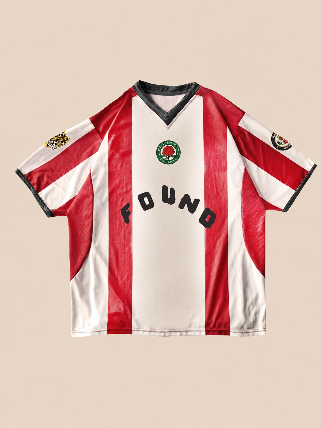 The FOUND Striped Stateman Jersey features red and white vertical stripes, black collar, chest crest, "FOUND" text, and sleeve patches—this vintage unisex football jersey adds classic sportswear style to your collection. Displayed on a plain background.