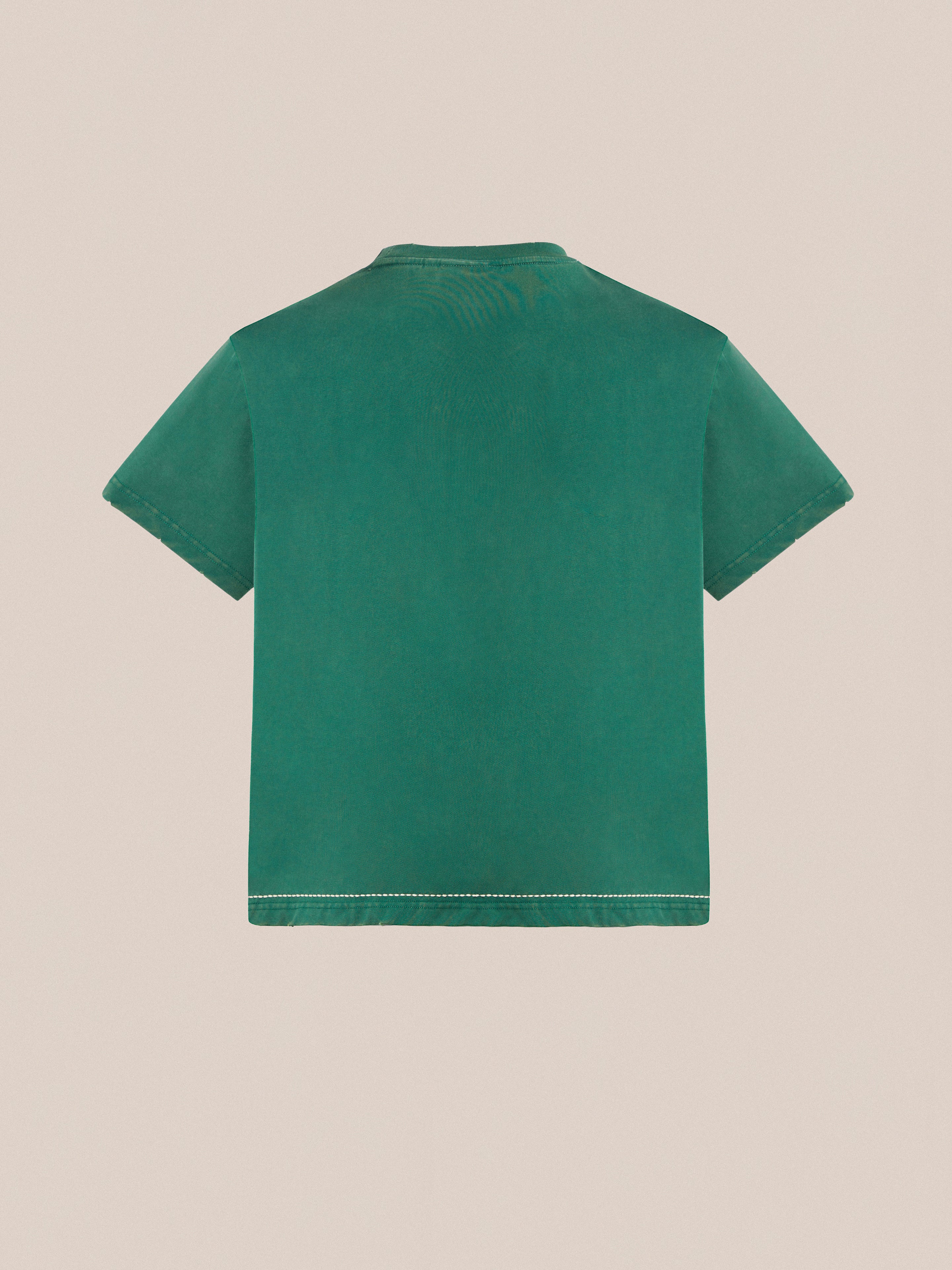 A green Found embroidered logo tee on a white background.