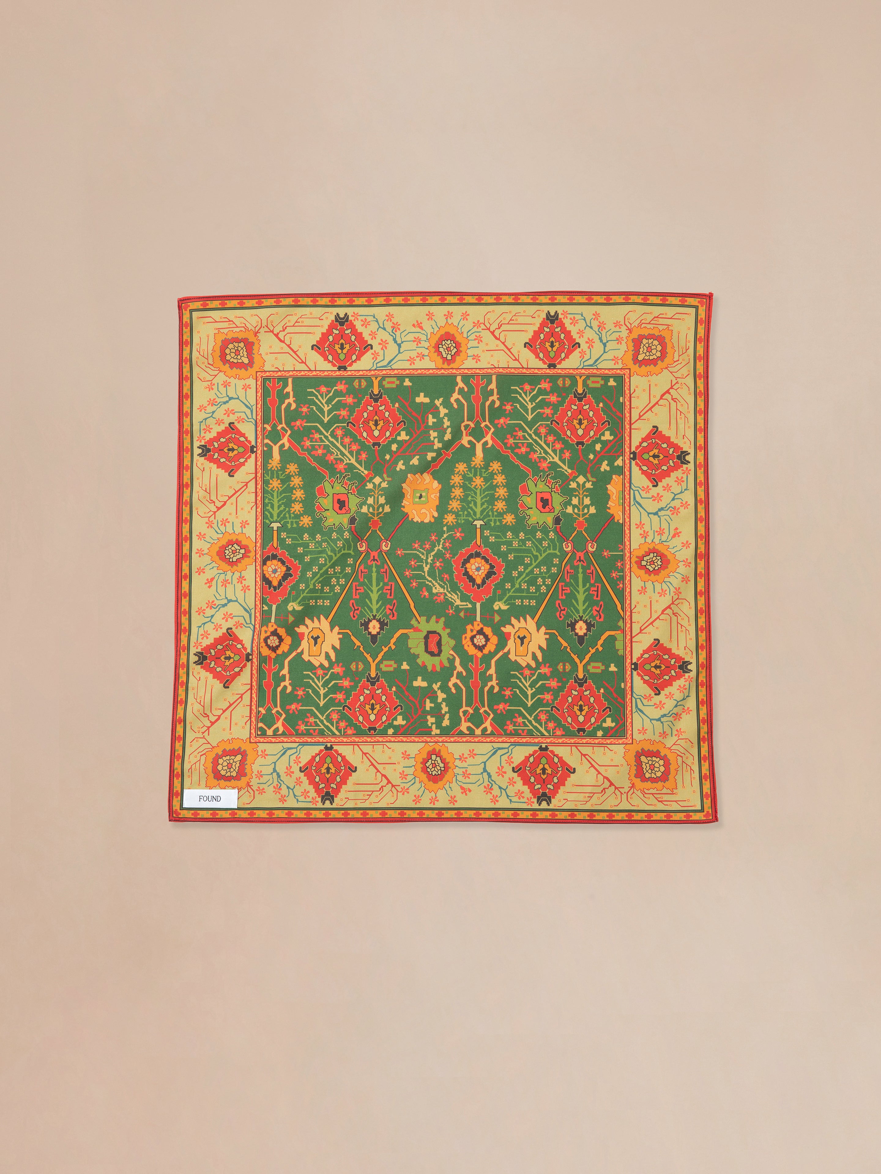 A cotton blend rug with a red and orange Found Botanical Mosaic Bandana design.