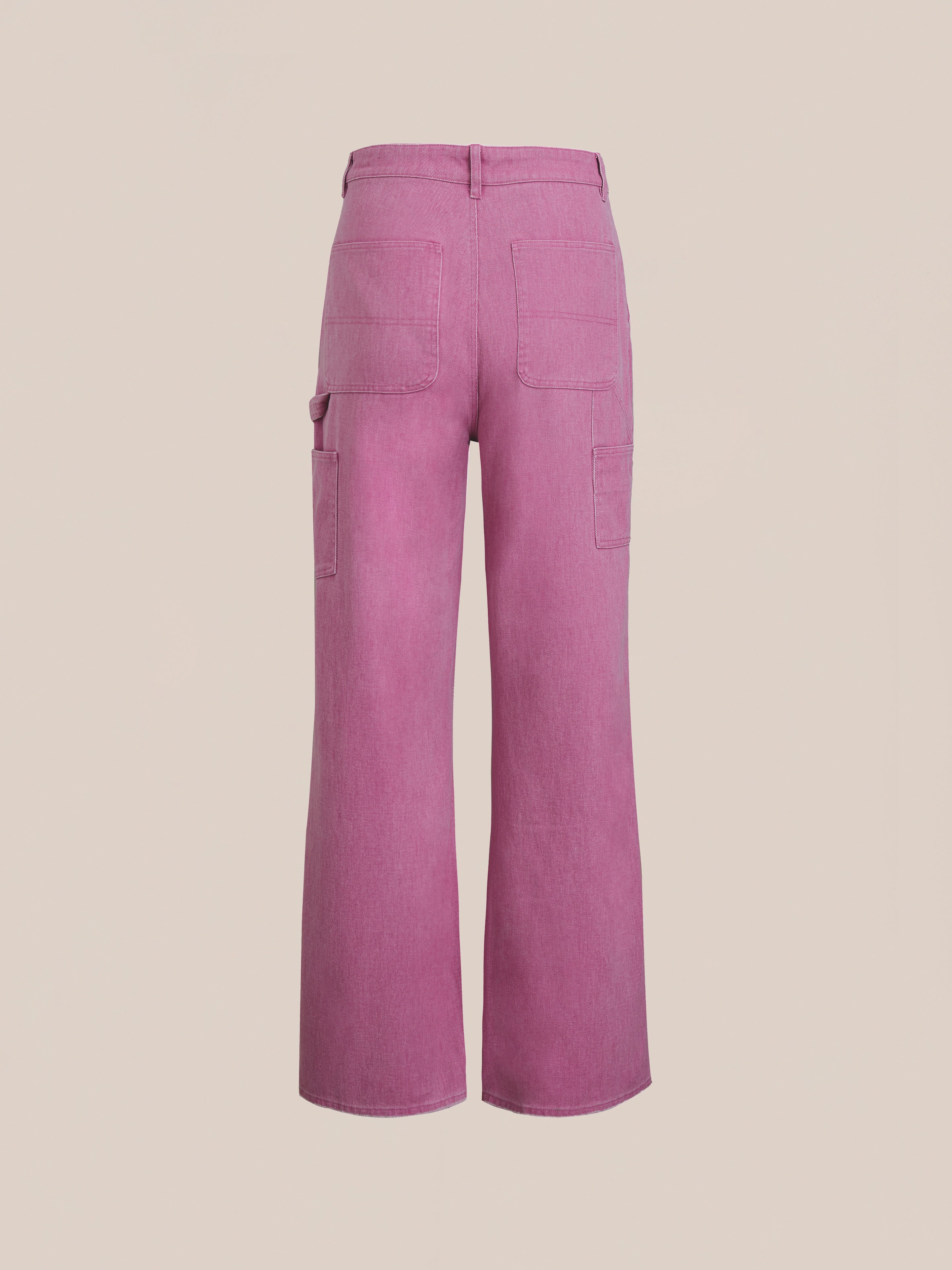 Back view of FOUND Flare Work Pants—high-waisted, wide-leg pink jeans with patch pockets and a right-leg utility pocket. These unisex pants combine relaxed fit and functional style, making them perfect for versatile workwear.