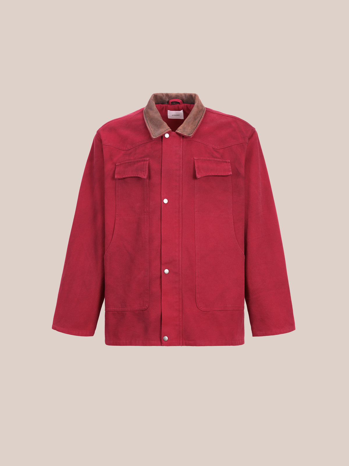 Found Canvas Utility Barn Jacket featuring a corduroy collar, front snap buttons, two chest flap pockets, and two large side pockets, displayed against a plain beige background.