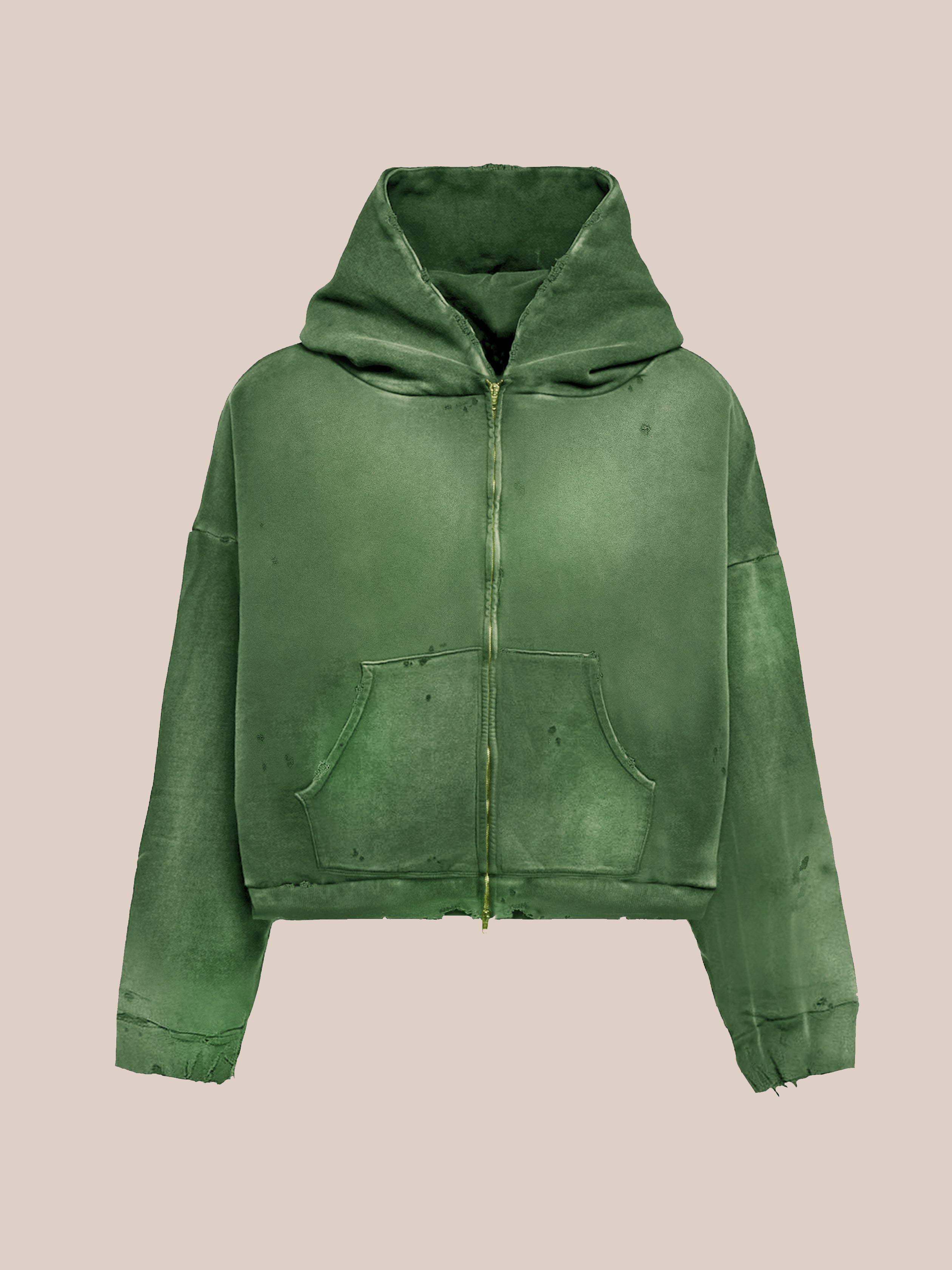 The FOUND Distressed Thermal Lined Zip Up Hoodie features a unisex relaxed fit, hood, and front pockets in green, shown against a plain beige background.