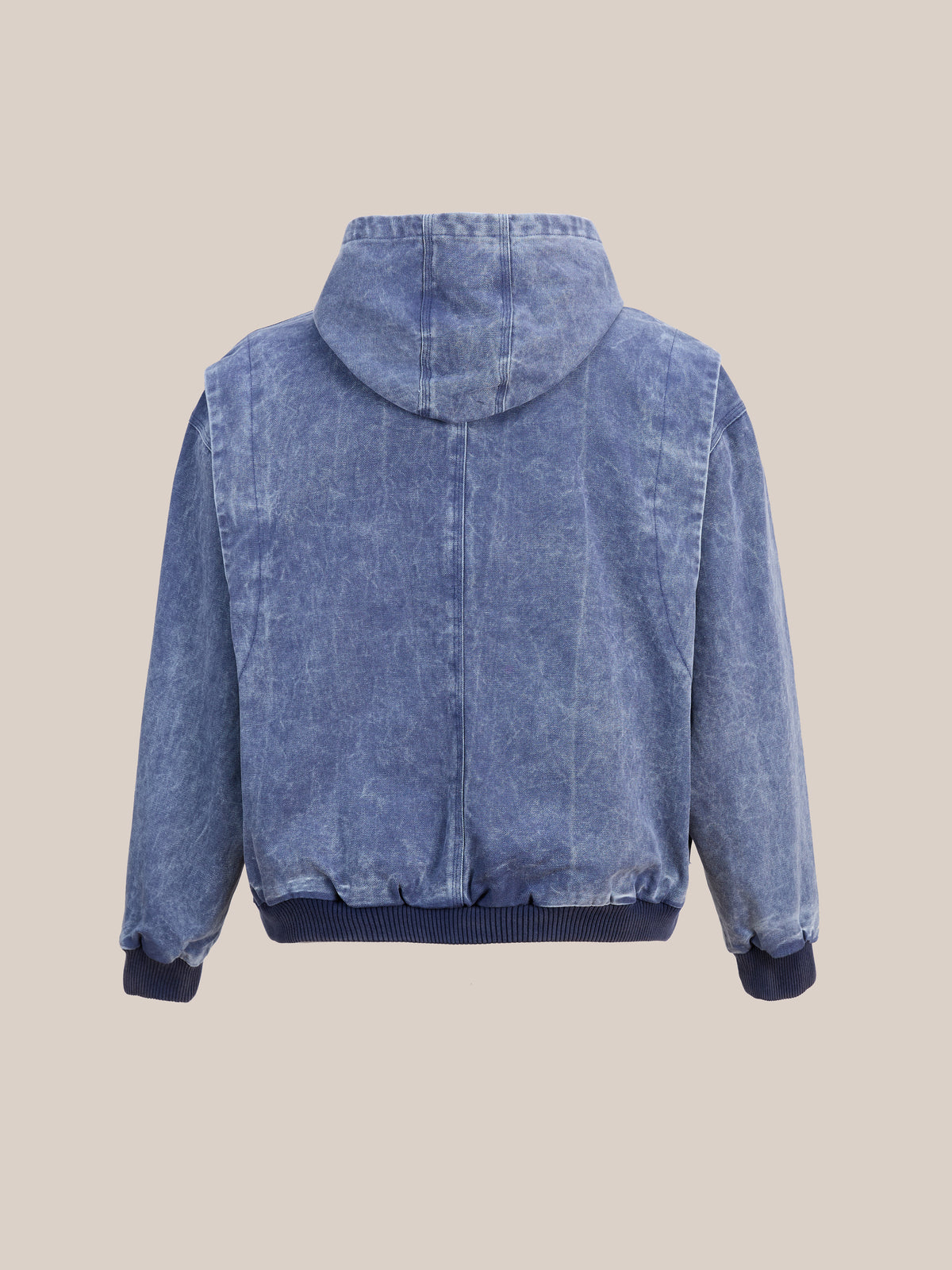 FOUND Faded Canvas Work Hoodie shown from the back against a plain beige background, featuring blue acid-wash denim, a plaid-lined hood, long sleeves, ribbed cuffs, and a ribbed waistband.