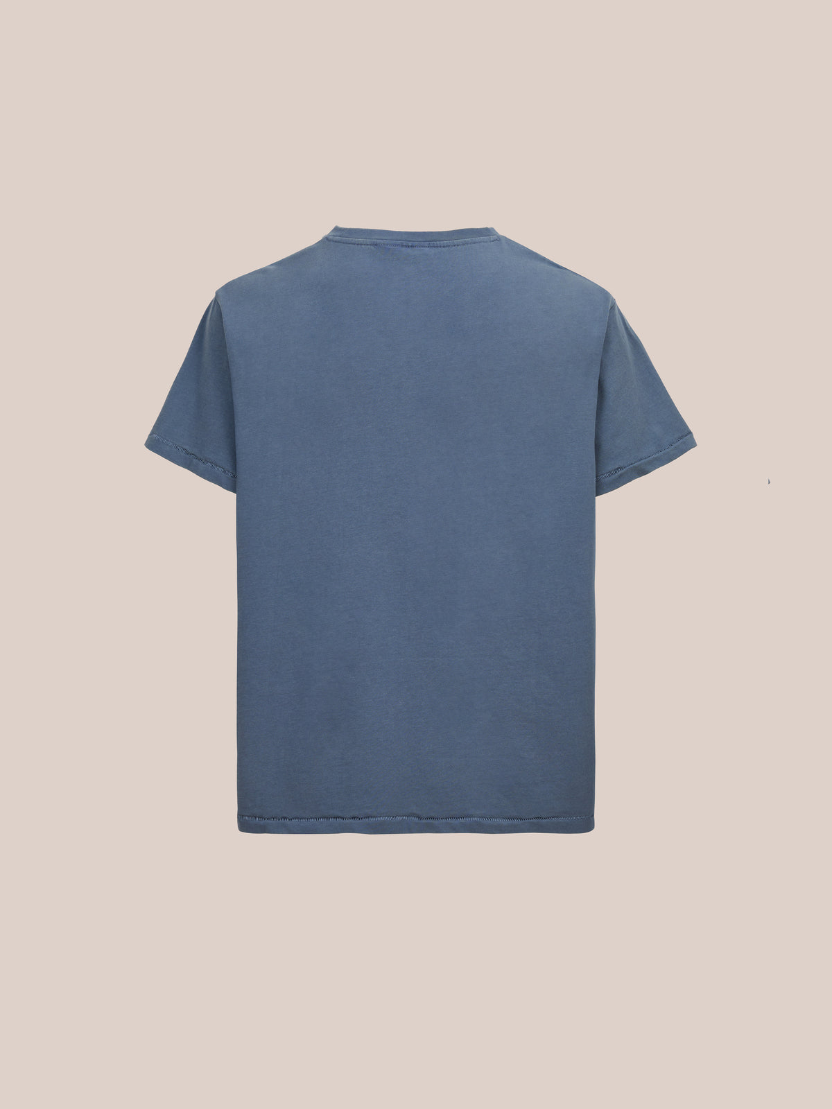 The Faded Horse Trot Tee by FOUND is a plain blue, unisex relaxed-fit short-sleeve tee, shown from the back on a light beige background.