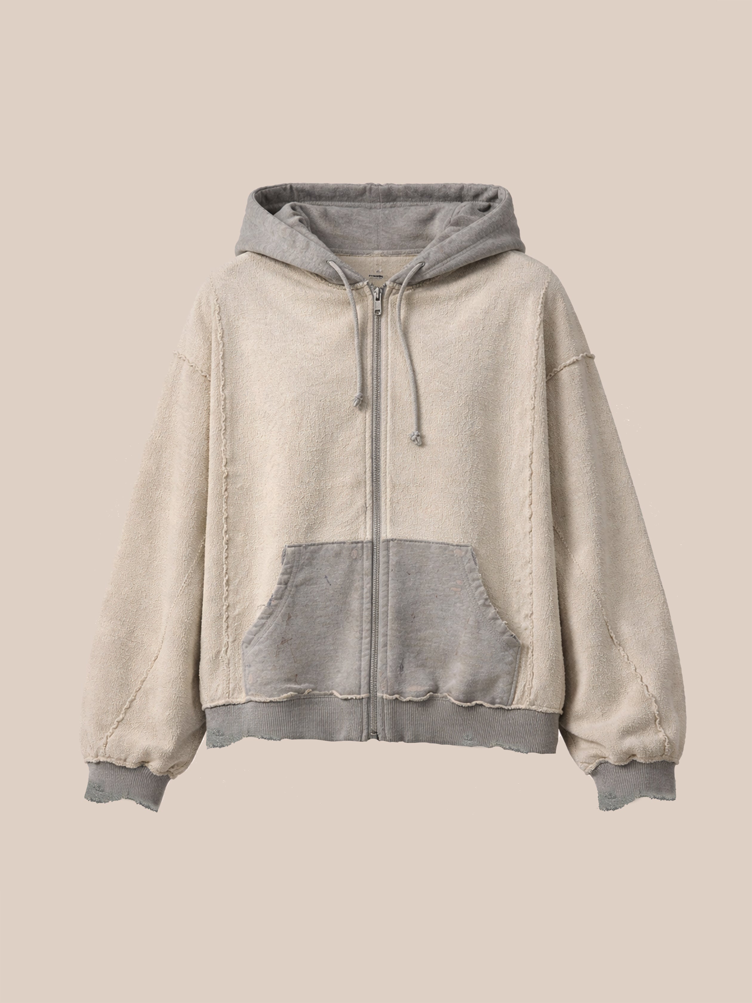 FOUND Inside Out Zip Up Hoodie, a unisex relaxed-fit zip-up in beige cotton with gray hood, cuffs, hem, and front pocket, shown on a plain light background.