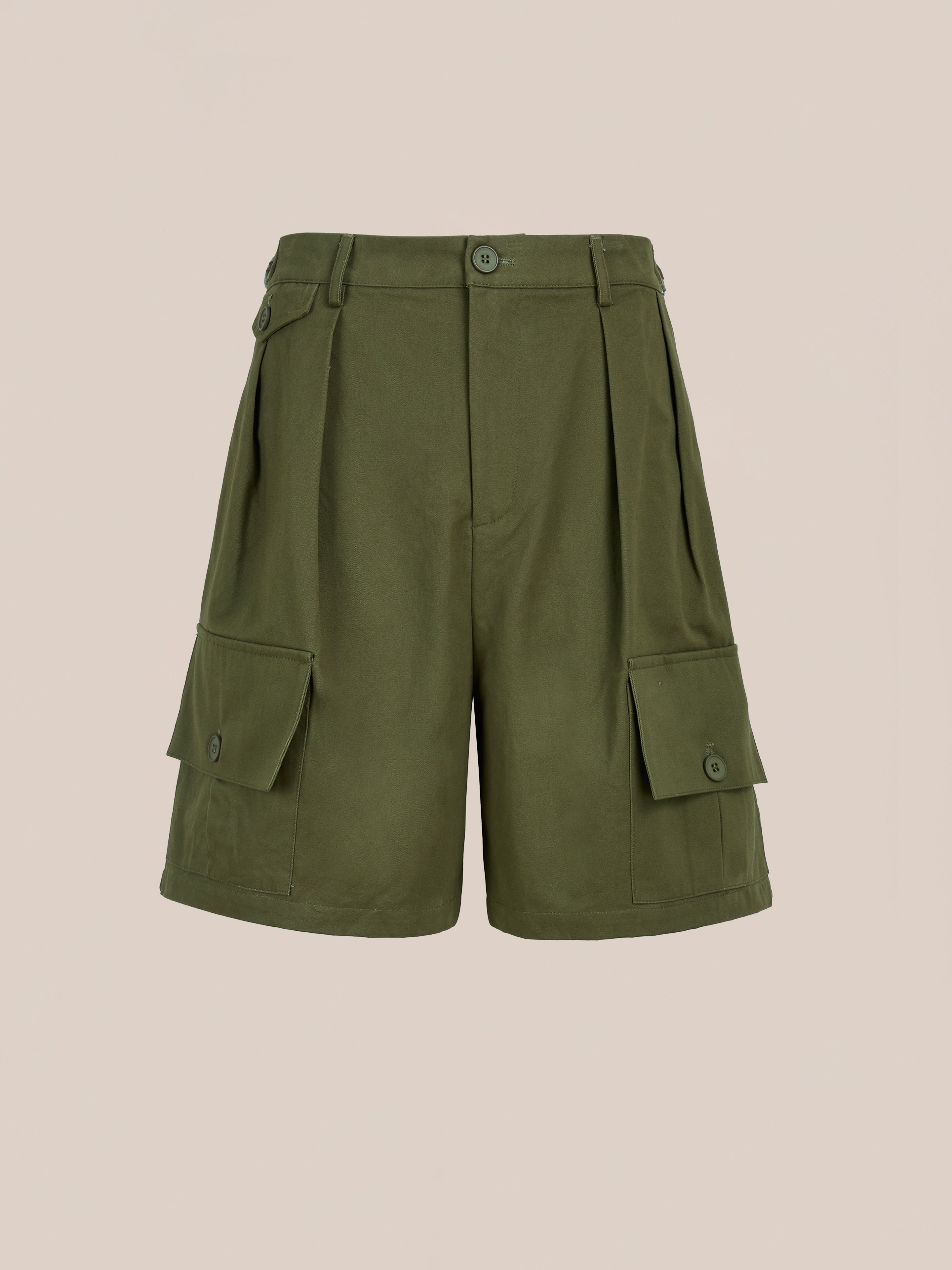 Found Multi Pocket Shorts in olive green feature front pleats, belt loops, button and zip closure, and large buttoned side pockets for classic utility style, shown on a neutral background.