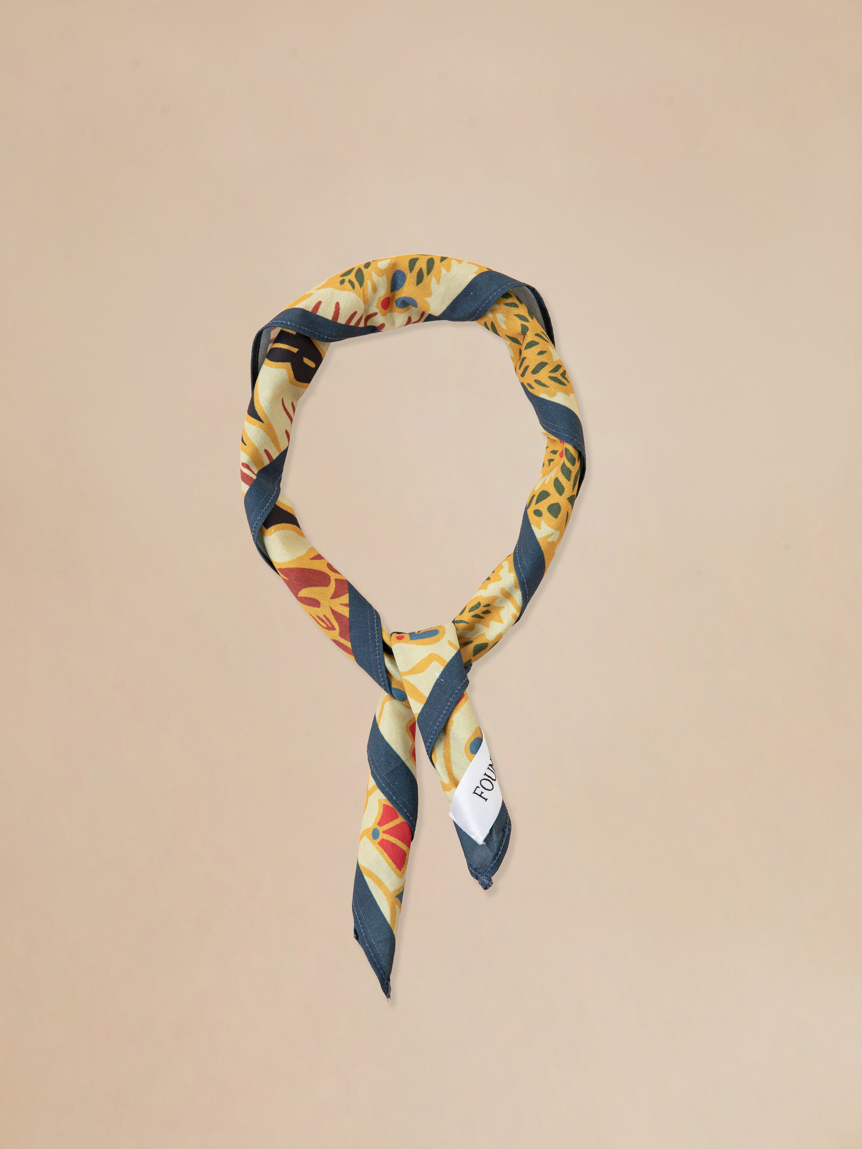 A pre-order Found Rainforest Bandana featuring Phulkari artwork.