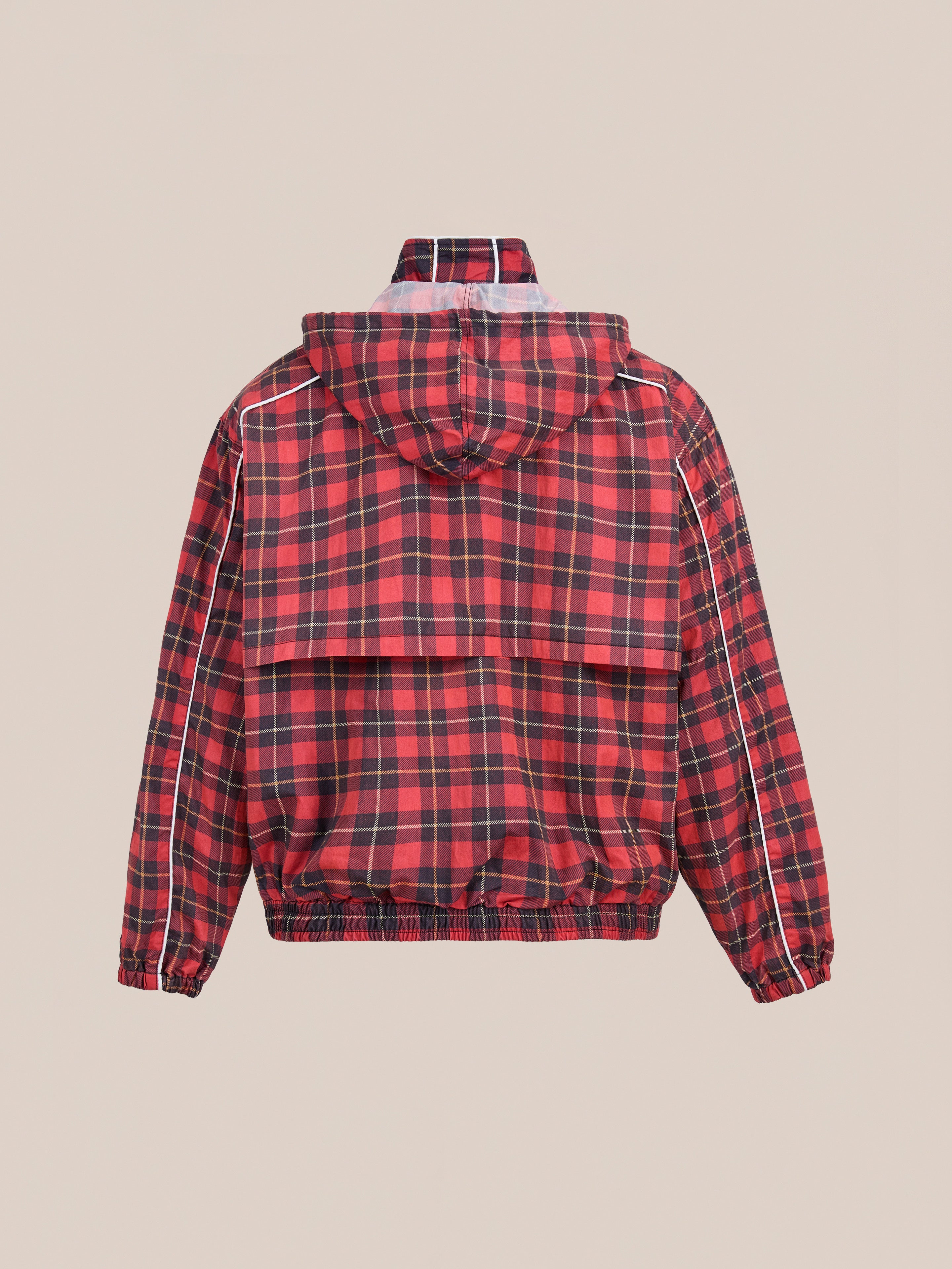 The FOUND Red Plaid Track Jacket showcases a red and black plaid design with a hood, elastic cuffs and hem, plus white sleeve piping, displayed from the back against a plain background.