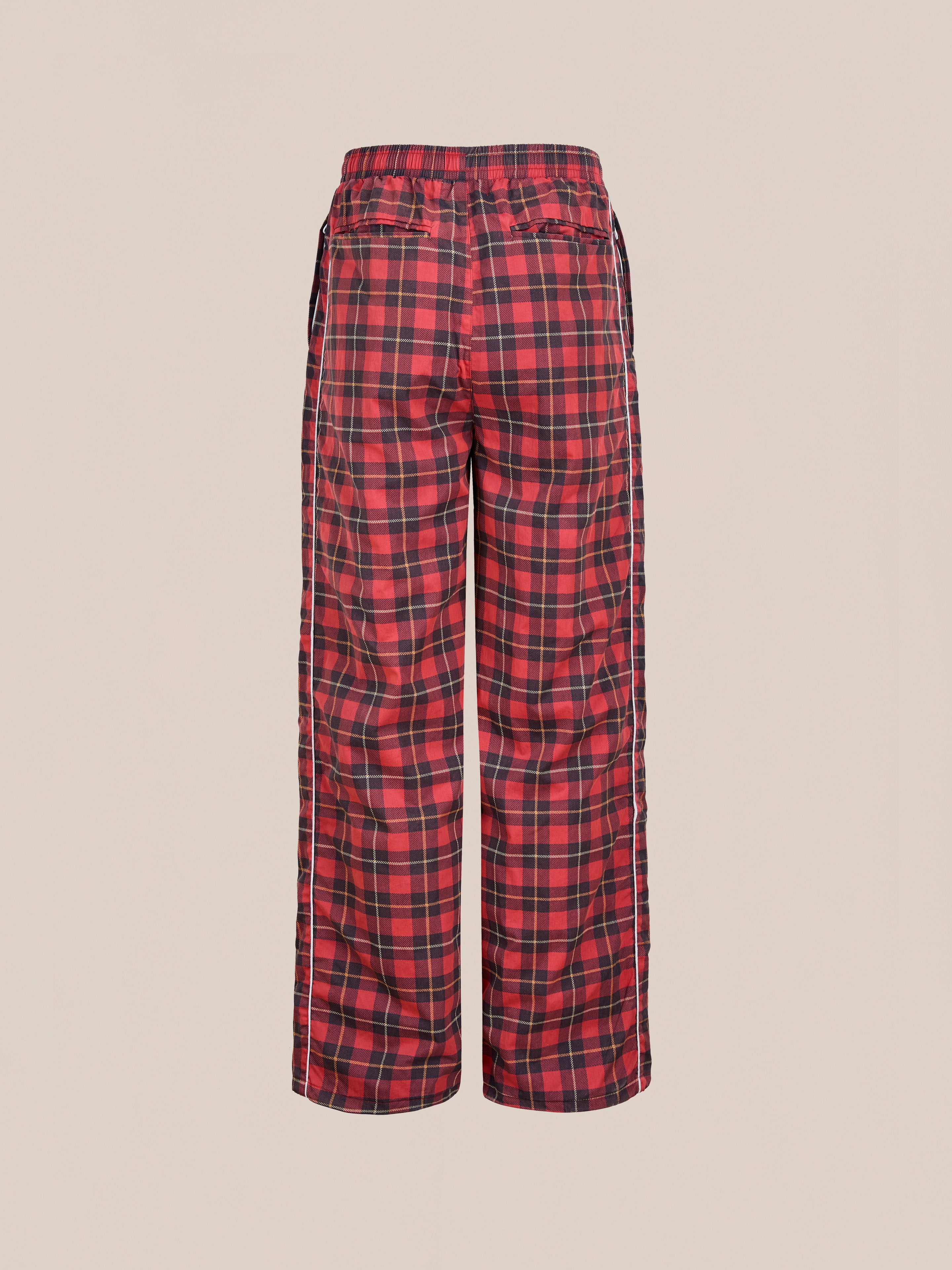 Back view of Found Red Plaid Track Pants featuring an elastic waistband and relaxed fit, shown against a plain light background.