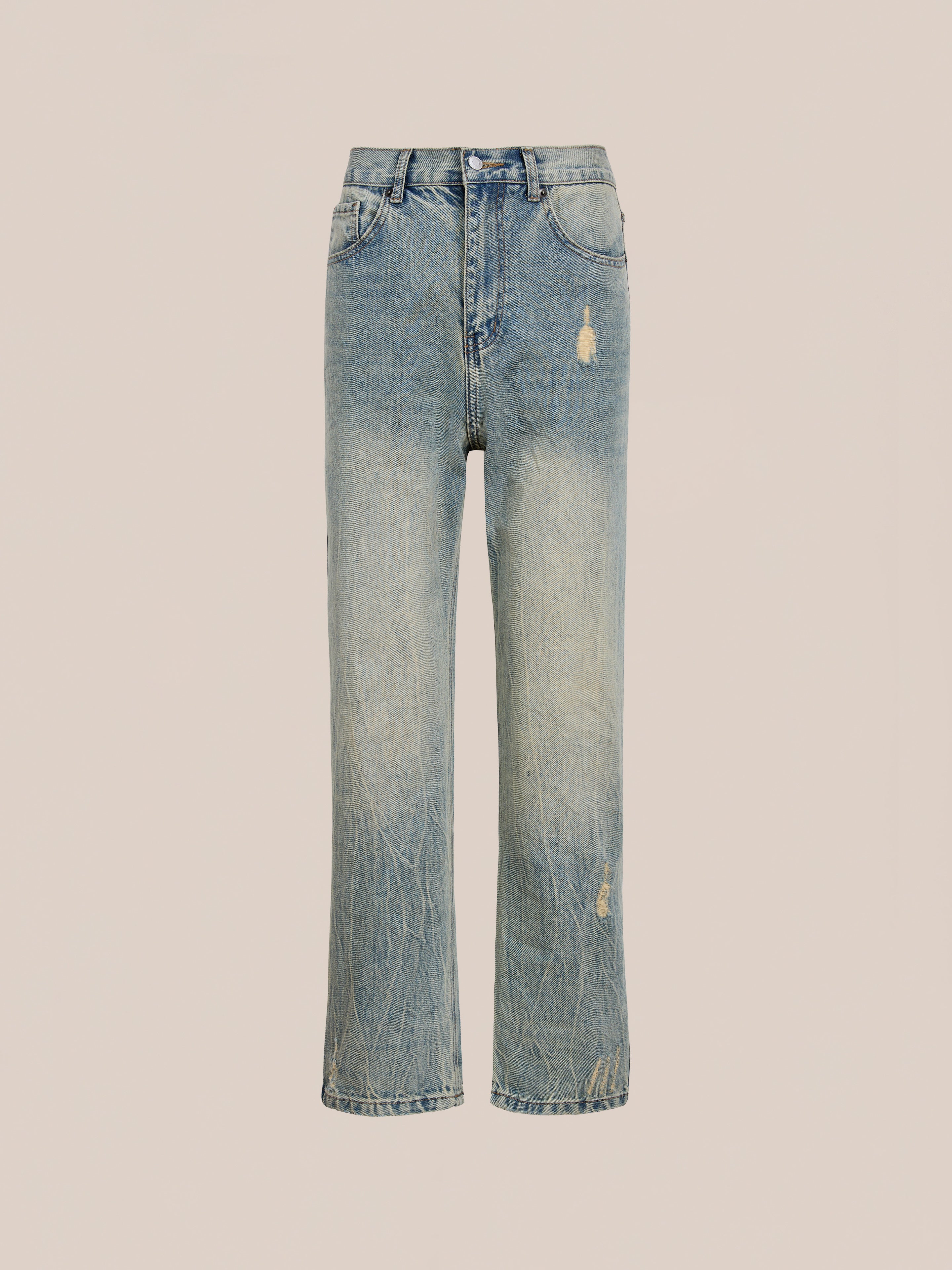 Found Straight Leg Jeans in light blue feature a high-waisted fit, classic silhouette, distressed accents, and visible fading on the thighs and knees, shown against a plain background.