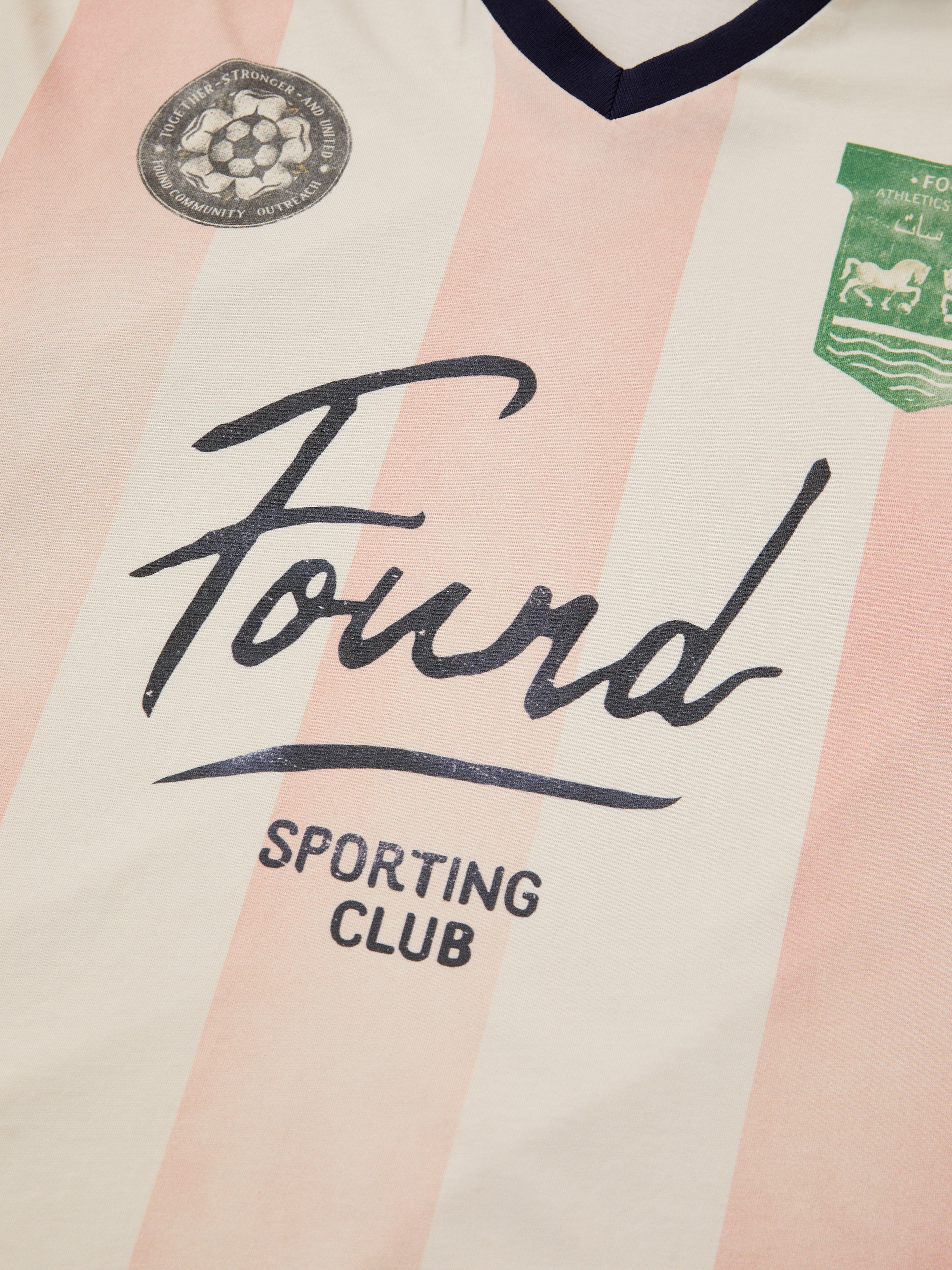 A close-up of the FOUND Striped Sport LS Jersey shows its cream and pink stripes, unisex relaxed fit, "Found Sporting Club" text, and two club badges on the chest.