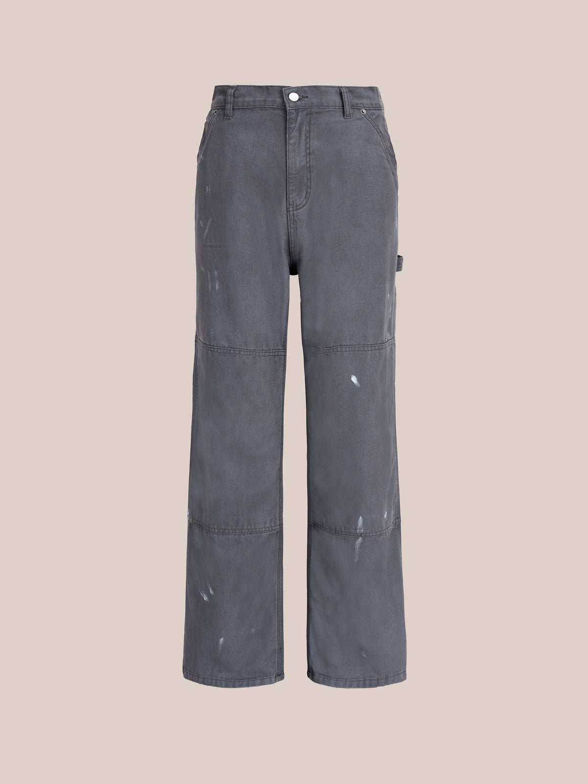 The FOUND Sunbleached Utility Pants feature a straight-leg fit, knee panels, white paint splatters, and a button closure for vintage workwear style.
