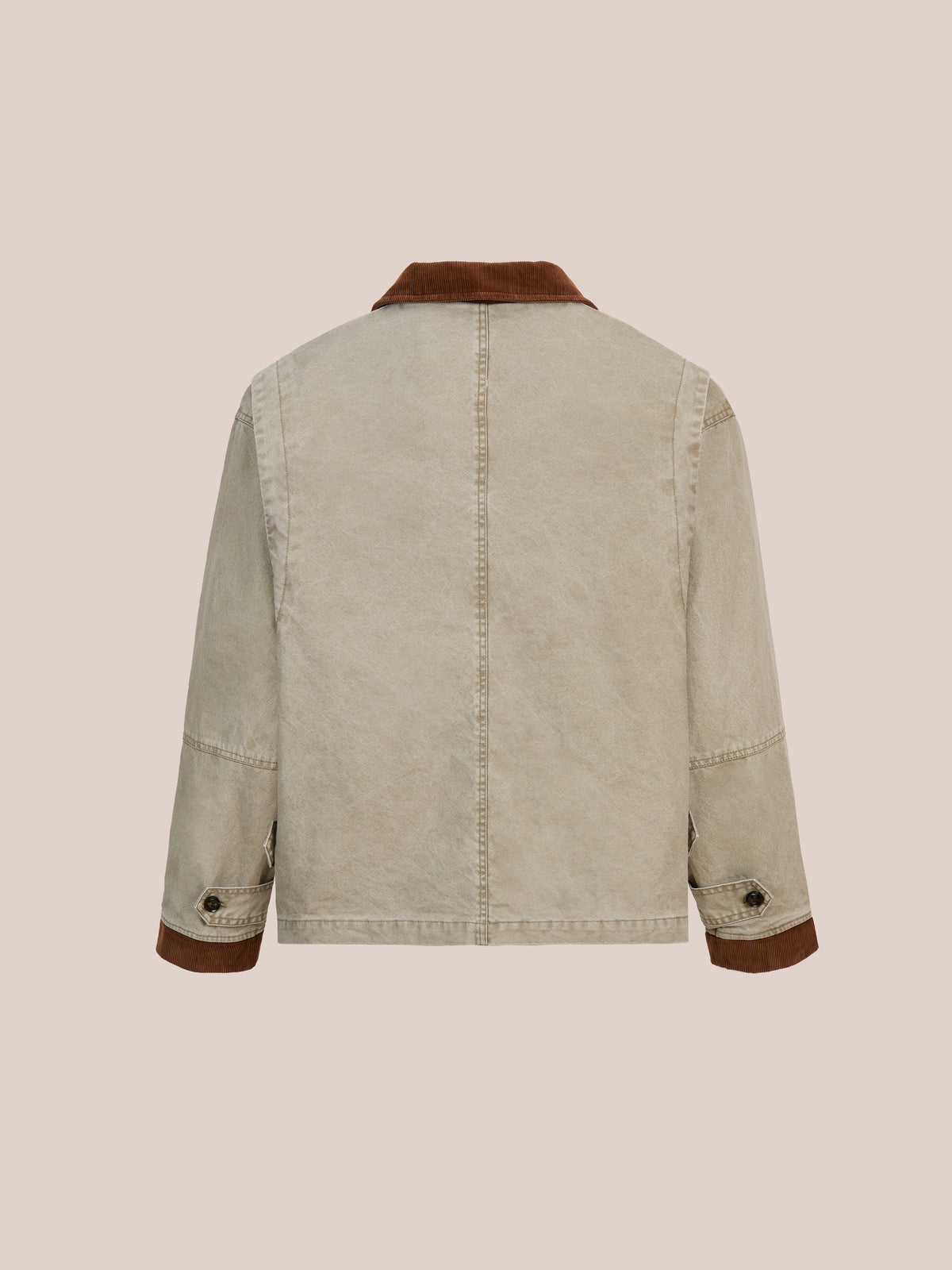 Back view of FOUND Toggle Work Jacket, vintage utility outerwear with brown collar and cuffs, in a unisex relaxed fit against a plain light background.