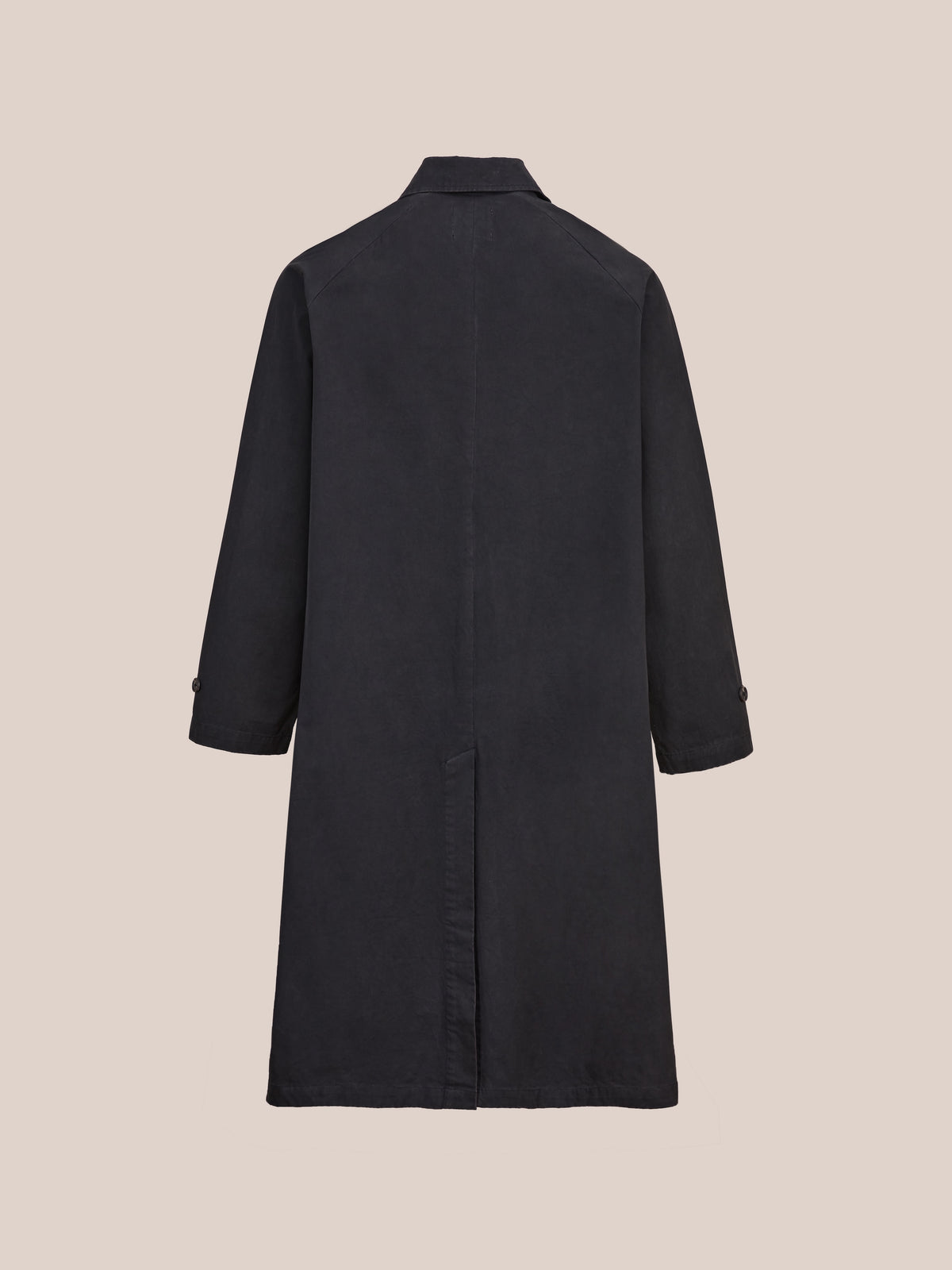 A long black FOUND Twill Work Trench Coat with long sleeves, shown from the back against a plain light beige background.