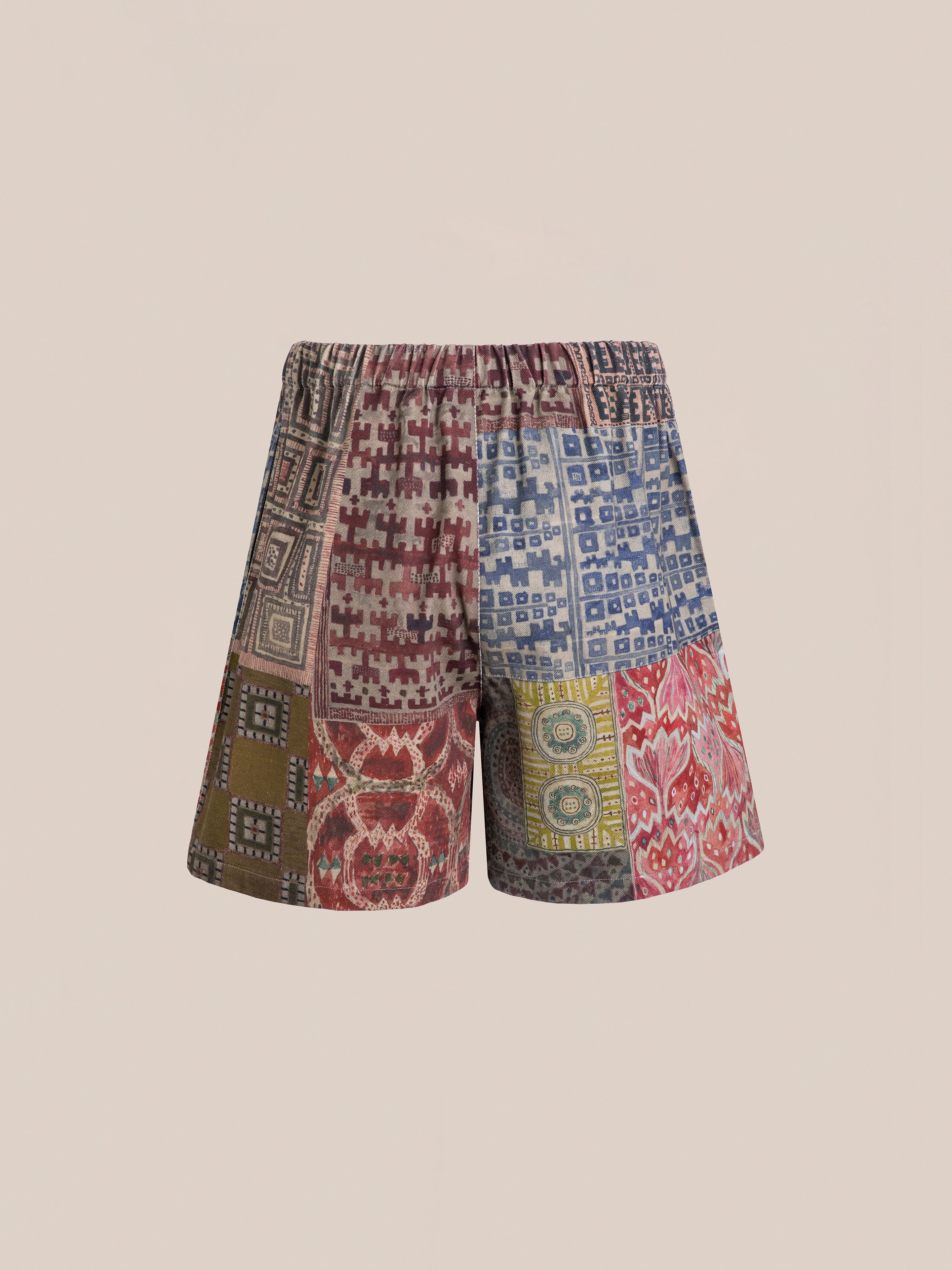 FOUND's Watercolor Mosaic Work Shorts feature unisex relaxed fit with vibrant patchwork style, combining vintage-inspired patterns and geometric designs on a plain background, adding artistic flair to any casual outing.