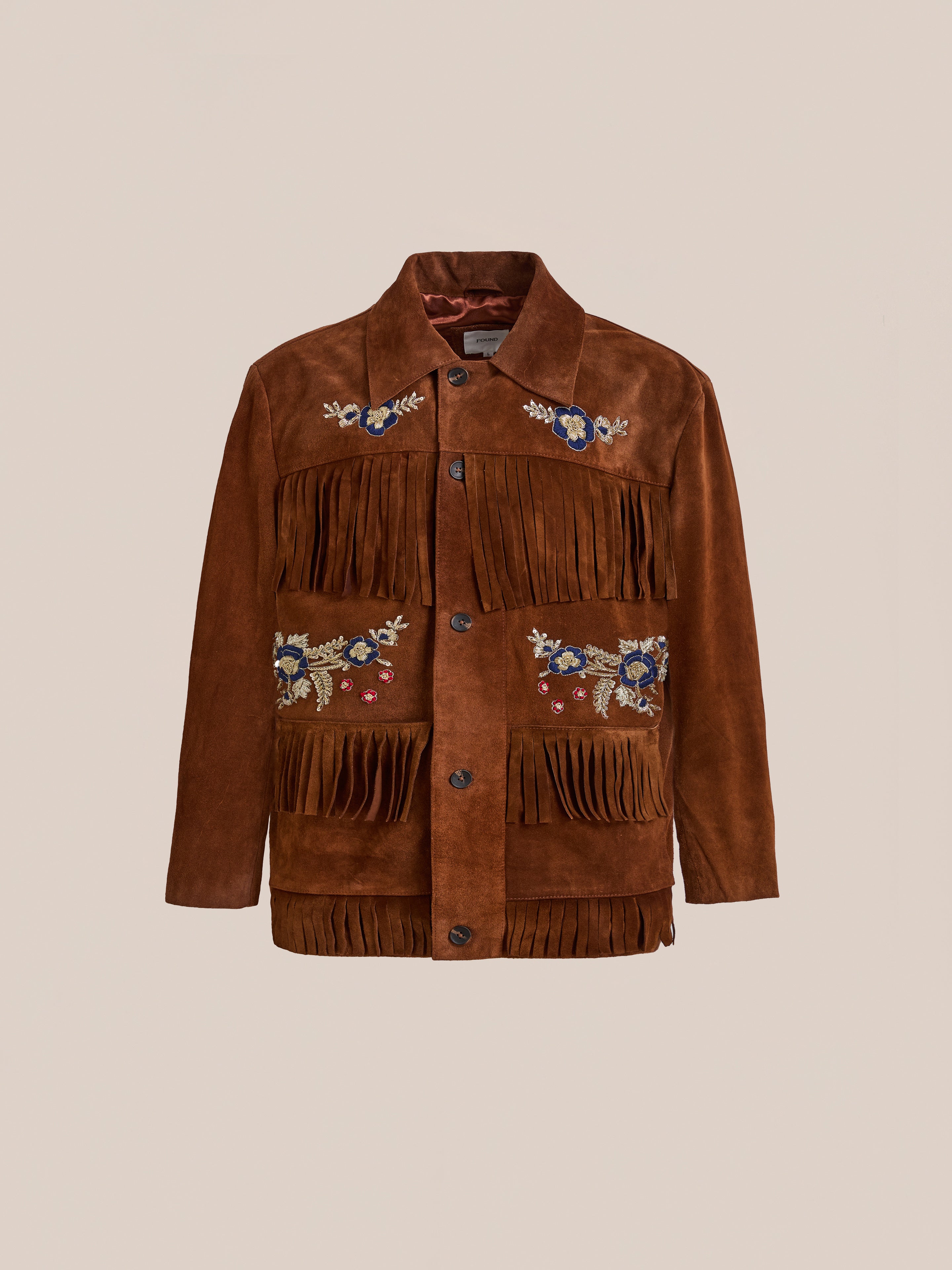 FOUND Hand Embroidered Suede Fringe Jacket in brown, featuring floral embroidery on the chest and pockets, shown against a plain light background.